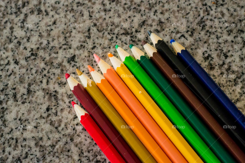Crayons in textured background