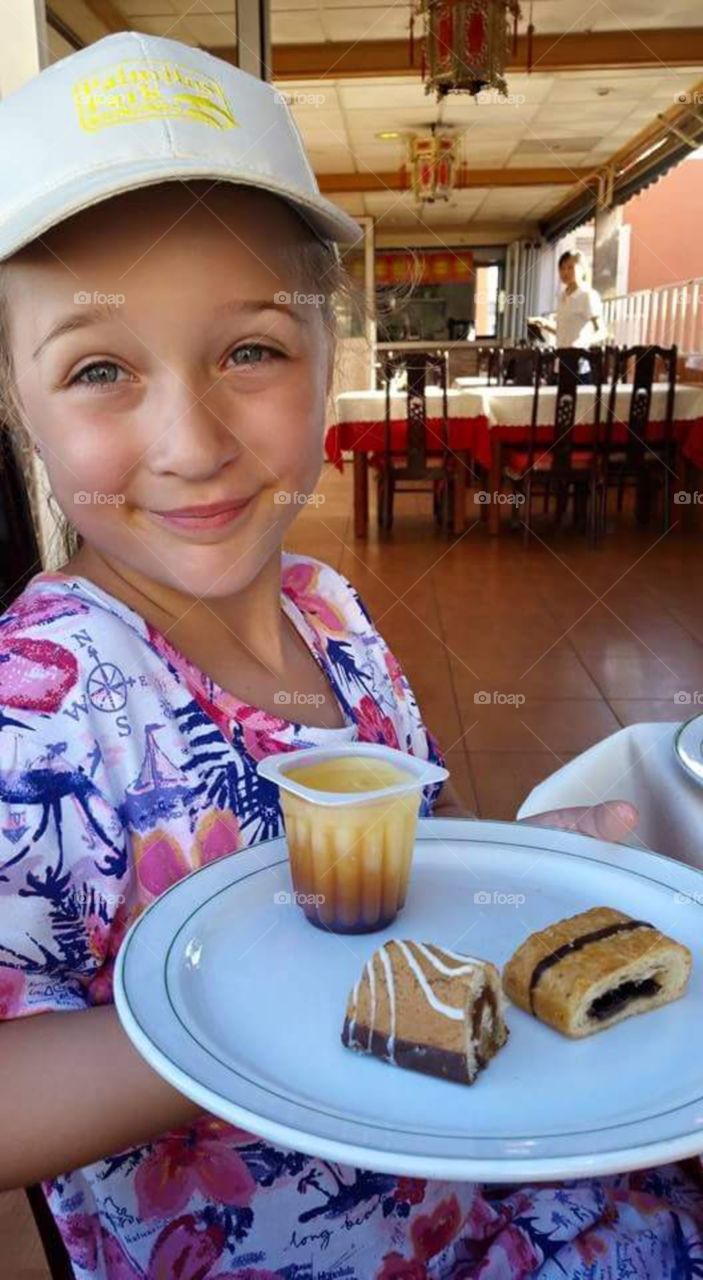child with puddings