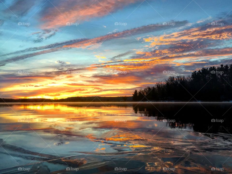 Massachusetts lake sunrise reflection