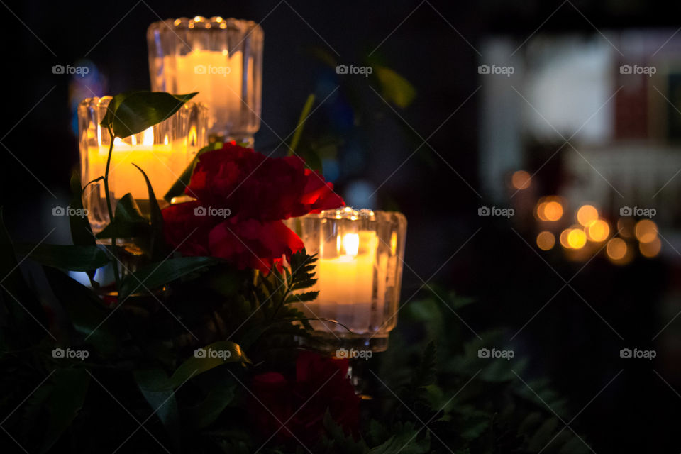 Candles and roses at church