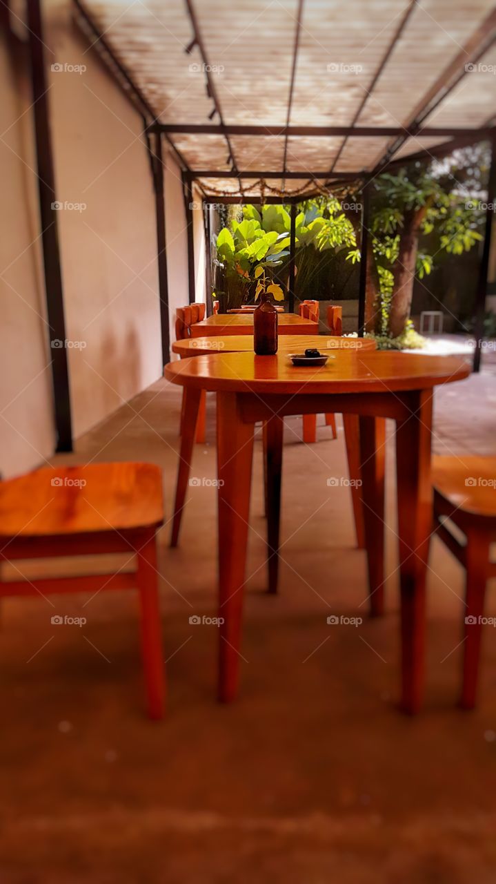 Wooden table and a few chairs in Yogyakarta