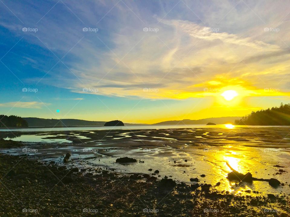 Sunset by the seat at lowtide