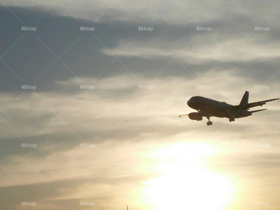 beautiful airplane flying cross the sky.