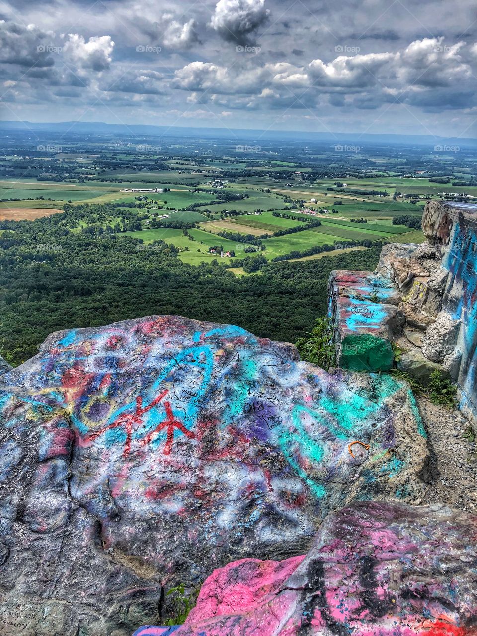 On top of high rock cascade Maryland painted rocks looking down Appalachian trail 