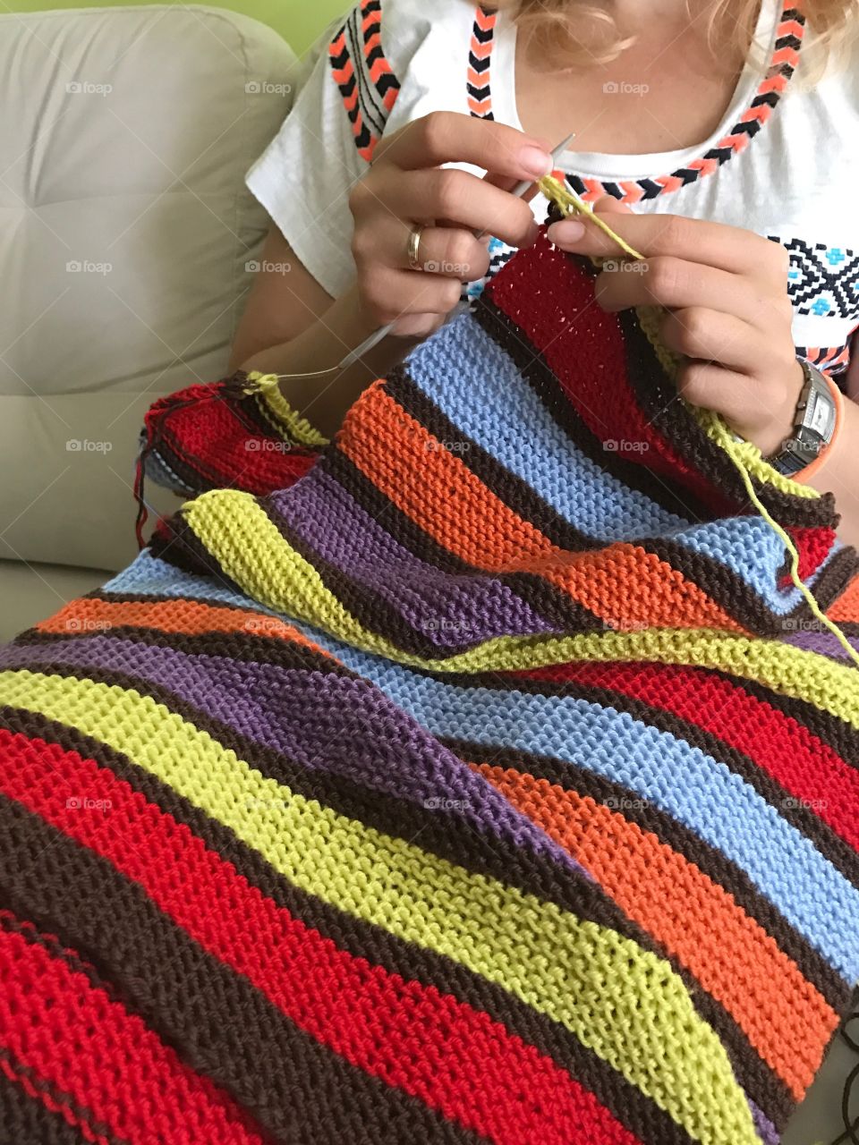 Knitting a stripy blanket