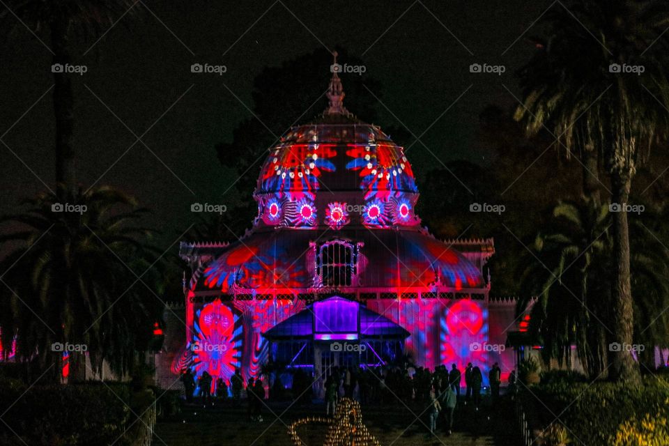 Nighttime illuminating light show in Golden Gate Park in San Francisco California at the Conservatory of Flowers 