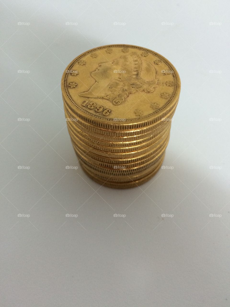 Gold coins. Stacking gold the old fashioned way. 