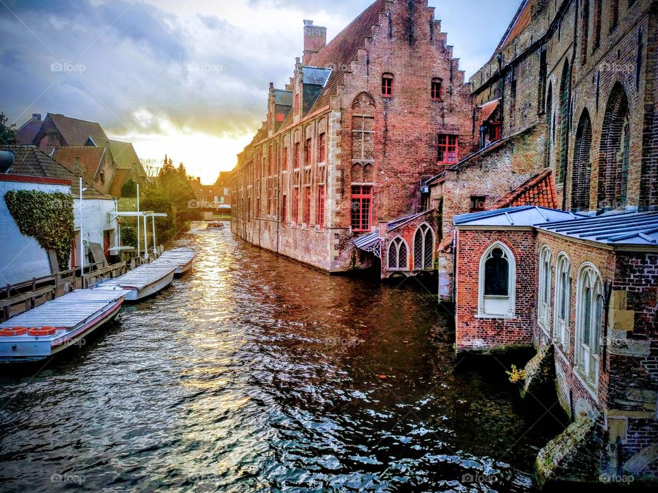 Sunset over the water channels in the city of Bruges