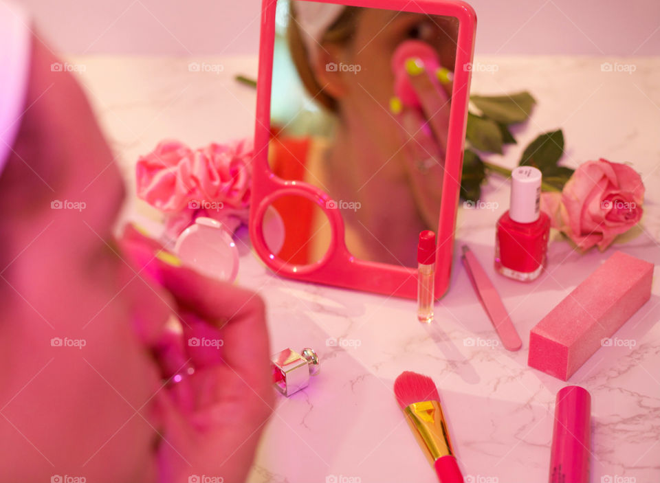 Pink Ready; Woman using Blender on face with pink toiletries; captured with a Pink Gel Flash