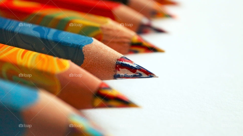 Variety of colorful pencils on white background