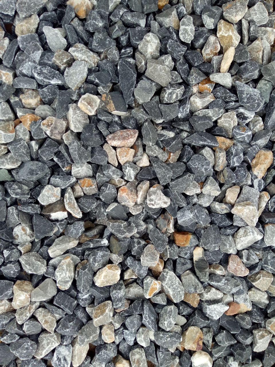 Close-up photo of assorted-color stone lot.