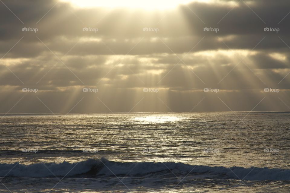 Idyllic view of sea at sunset