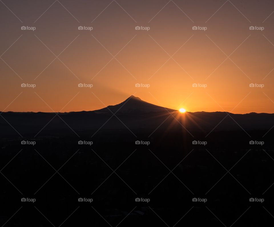 Silhouette of mountains during sunset