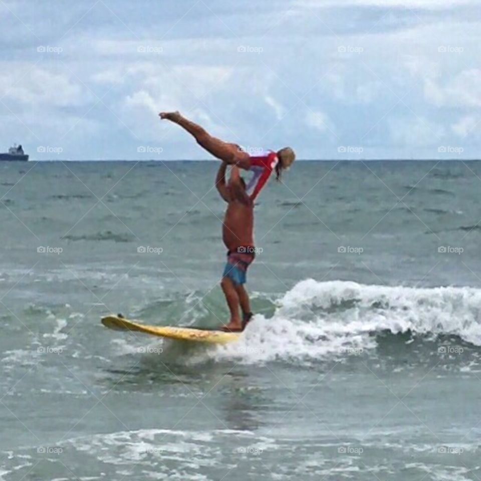 Tandem surfing couple