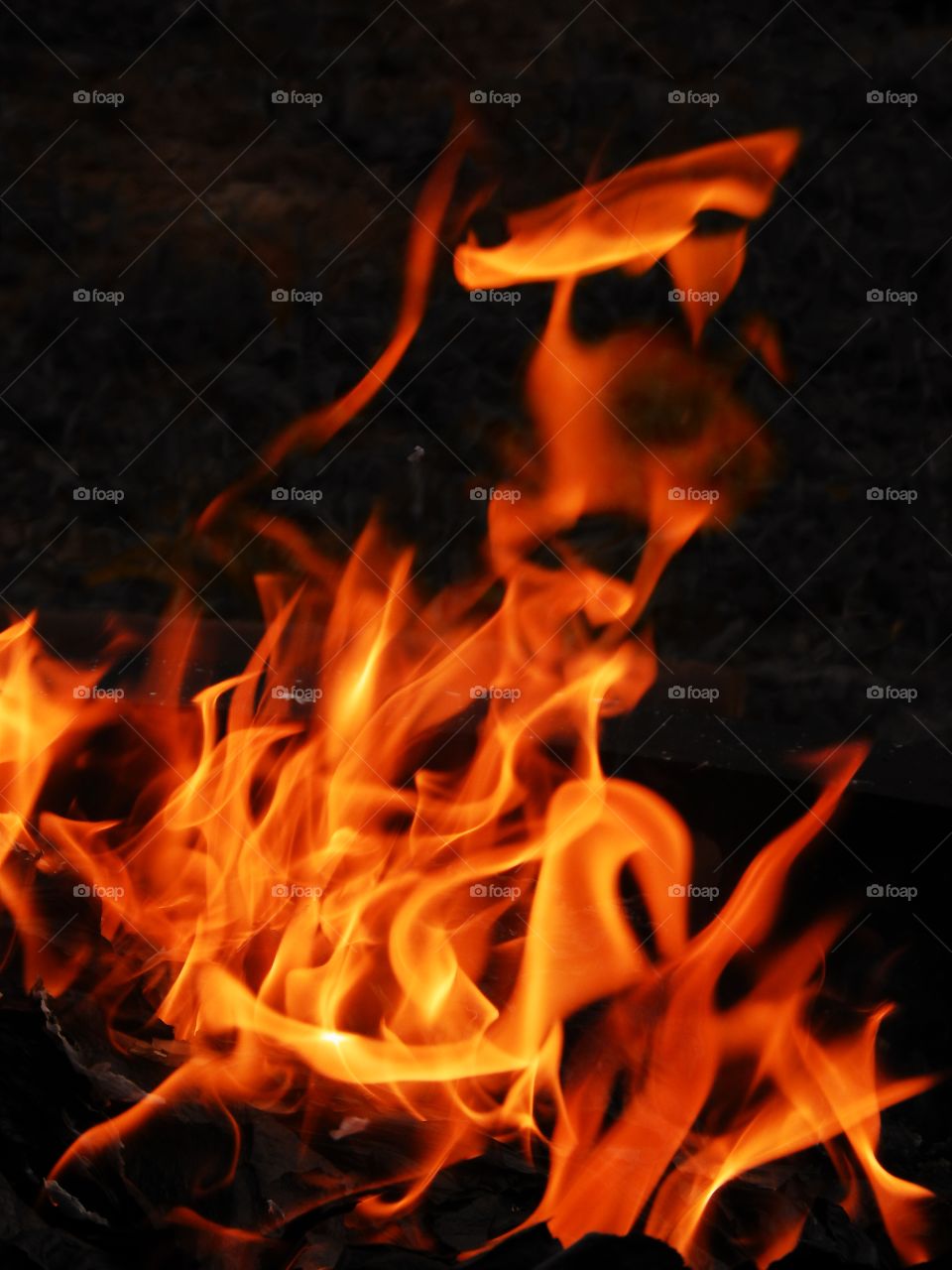 strange face seen in flames, fire
