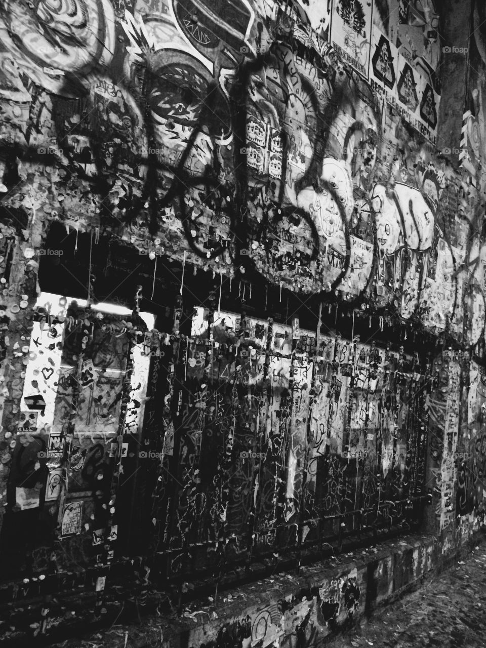 No humanity. Black and white photo of graffiti on the Gum Wall in Seattle, Washington