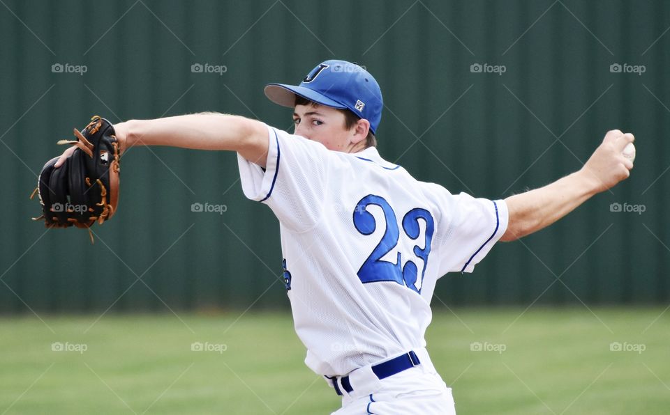 High school baseball player number 23. 