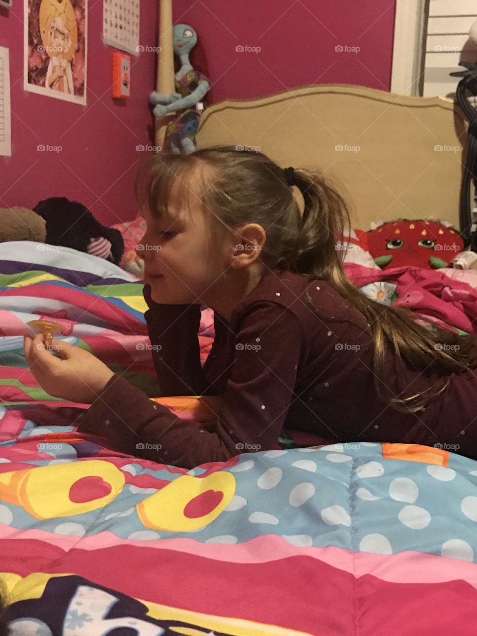 My beautiful daughter pretending to talk on her “ring phone” to her best friend. 