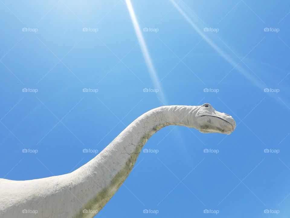 Low angle view of dinosaur statue