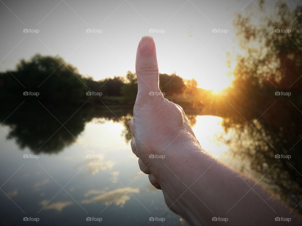 thumbs up to the sunrise