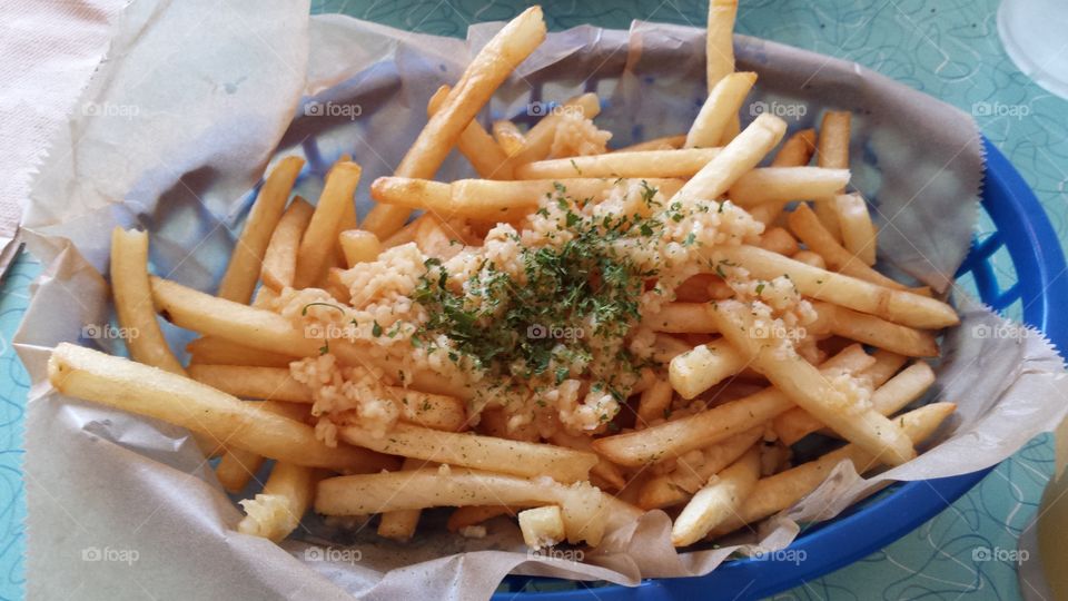 Garlic Fries. from Mustard's Last Stand in Melbourne, FL