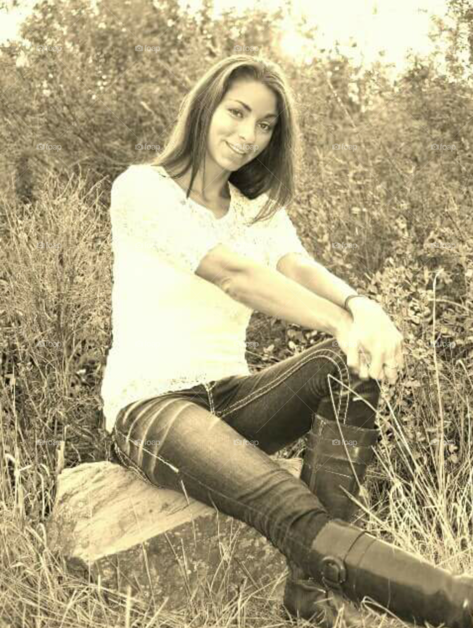 Sitting on a bump on a log