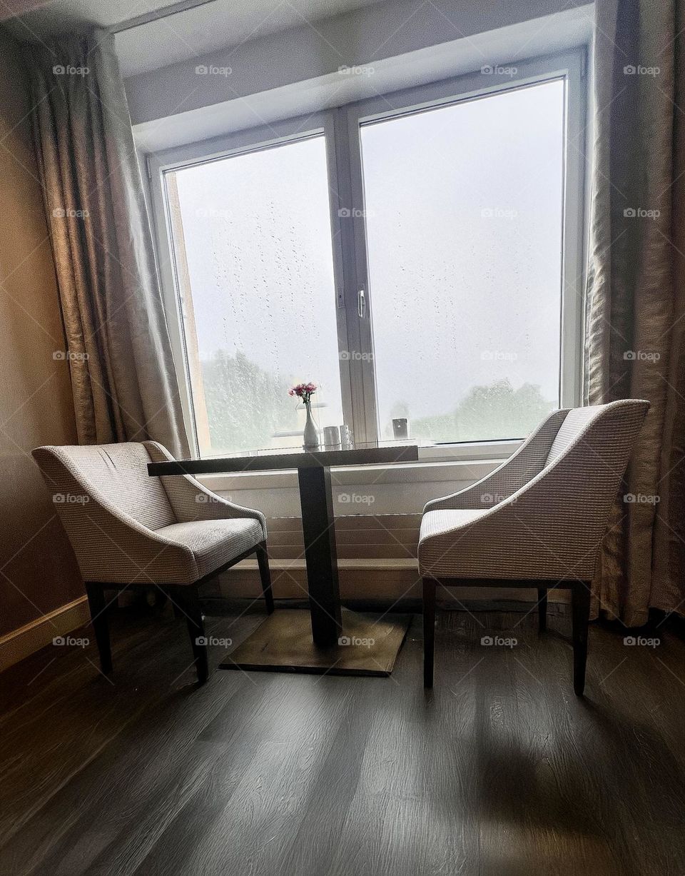 A table in a cafe for two people near the window