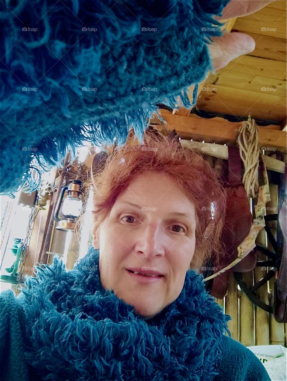 This young lady is getting ready to enjoy a home cooked meal at „Ron‘s Whiskey Lounge“ in rural „Bavaria“, Germany grilled on her new little wood stove. 2024. Hypnotic Productions