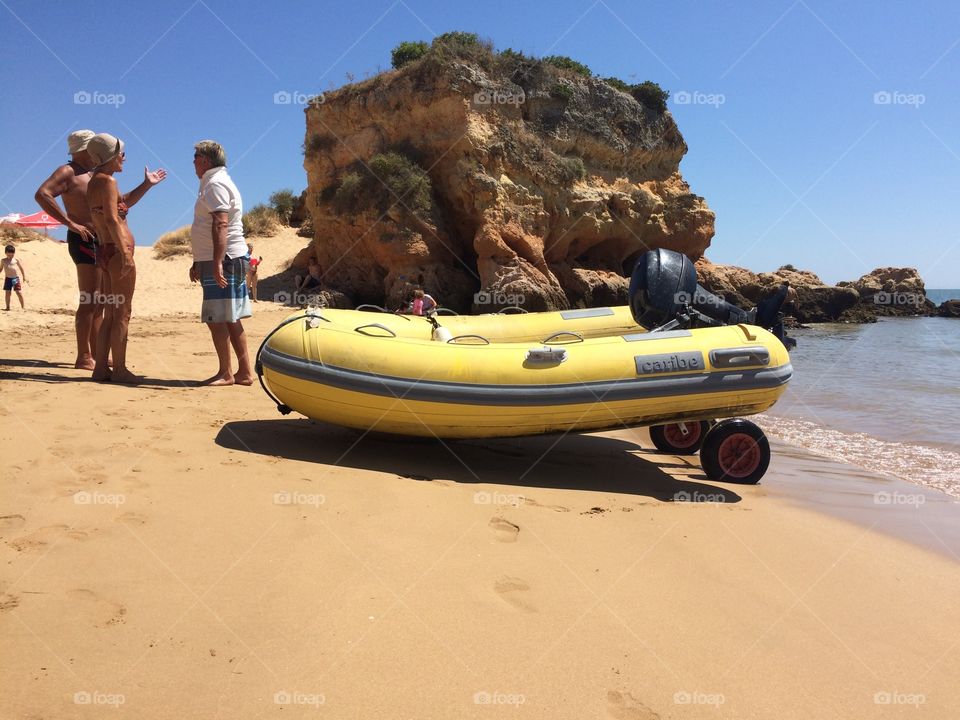 Dinghy on the beach. Our yellow dinghy Baby Annila, safetely on the beach