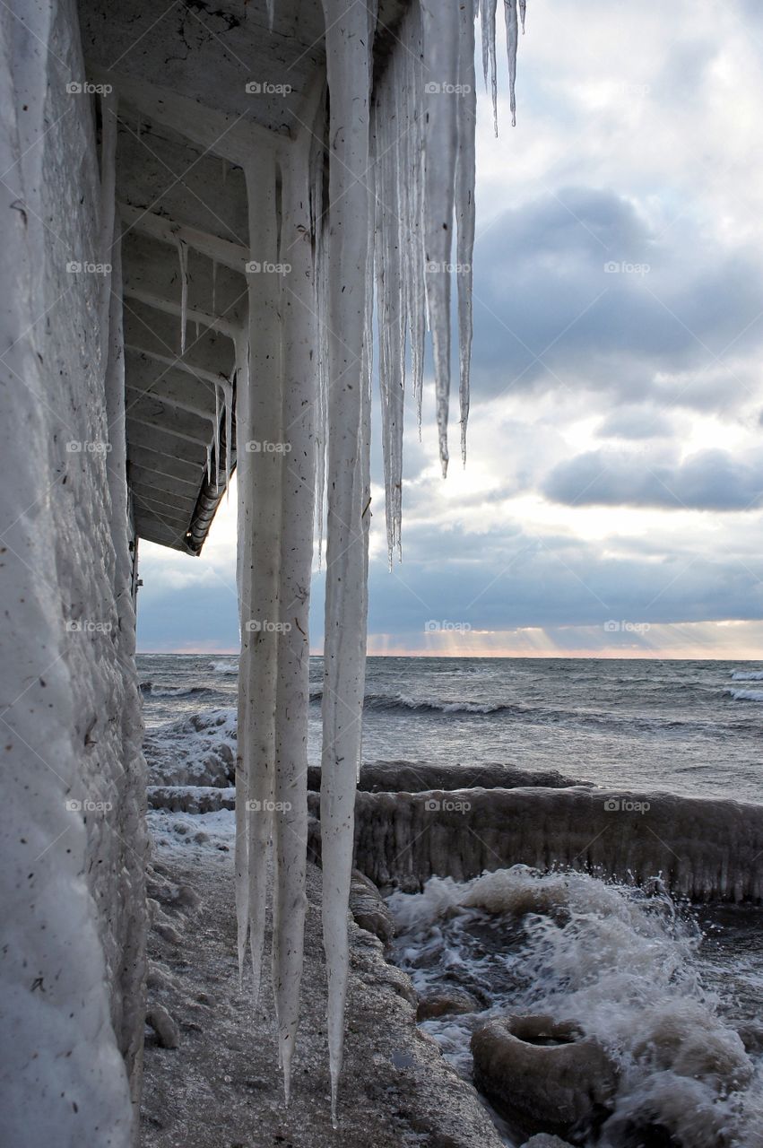 Close-up of frozen ice at beach