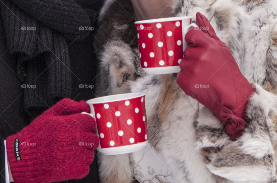 love drinking from red cups in the cold in mittens