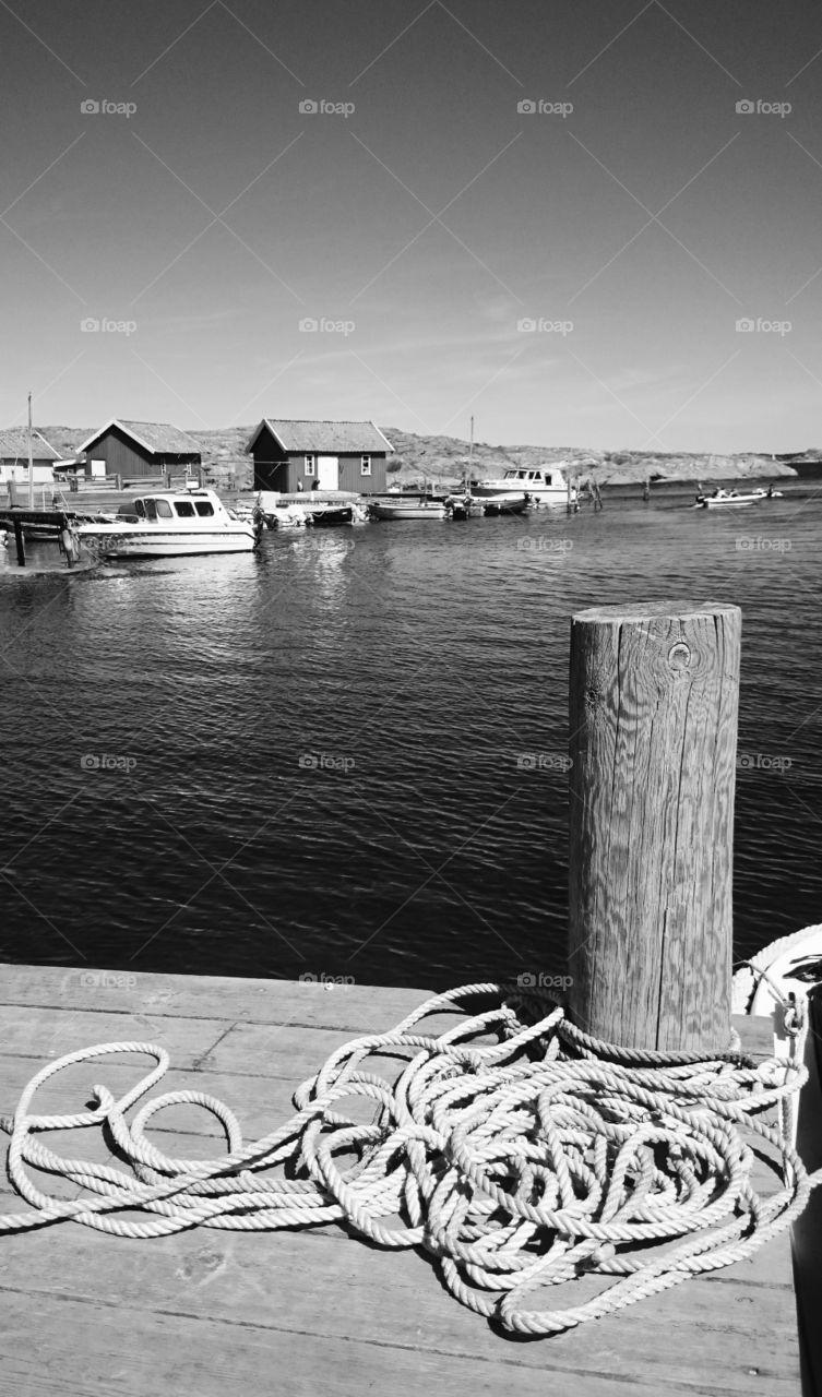 Wooden post at harbor, Sweden