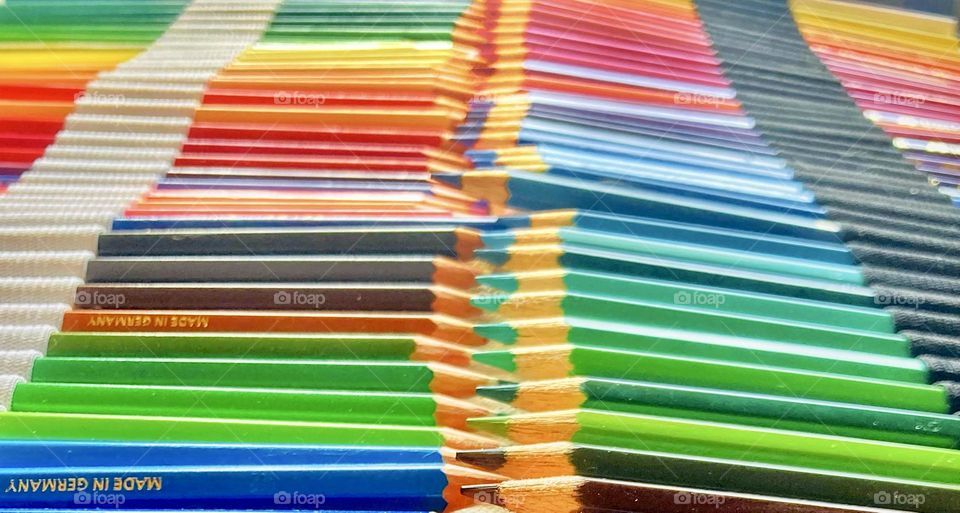 Colorfull picture. Colored pencils placed in pattern  Wood pencils.  intertwined