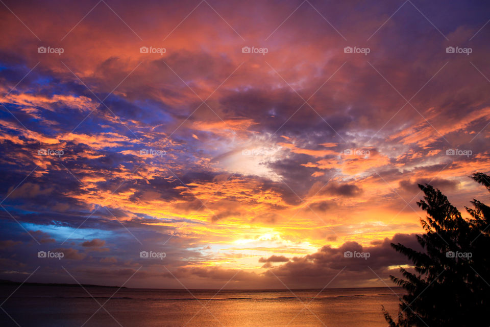Beautiful, picturesque sunset on the coast of Saipan.