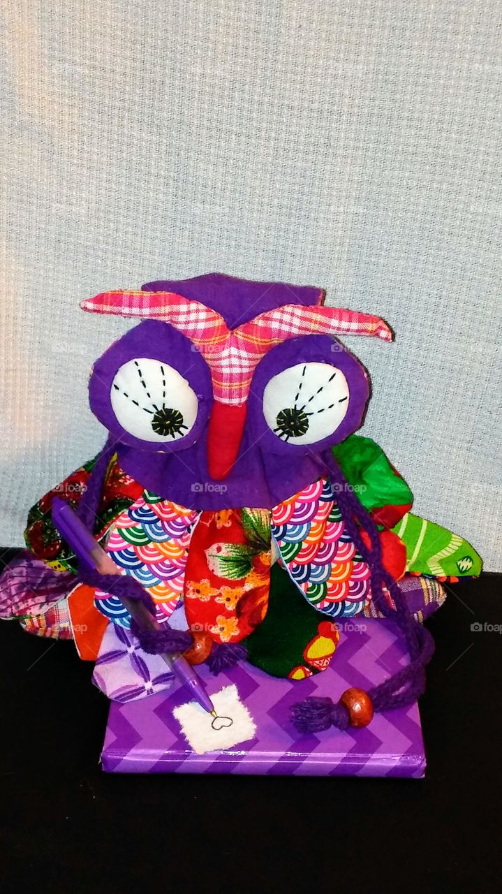 A toy with gift on table