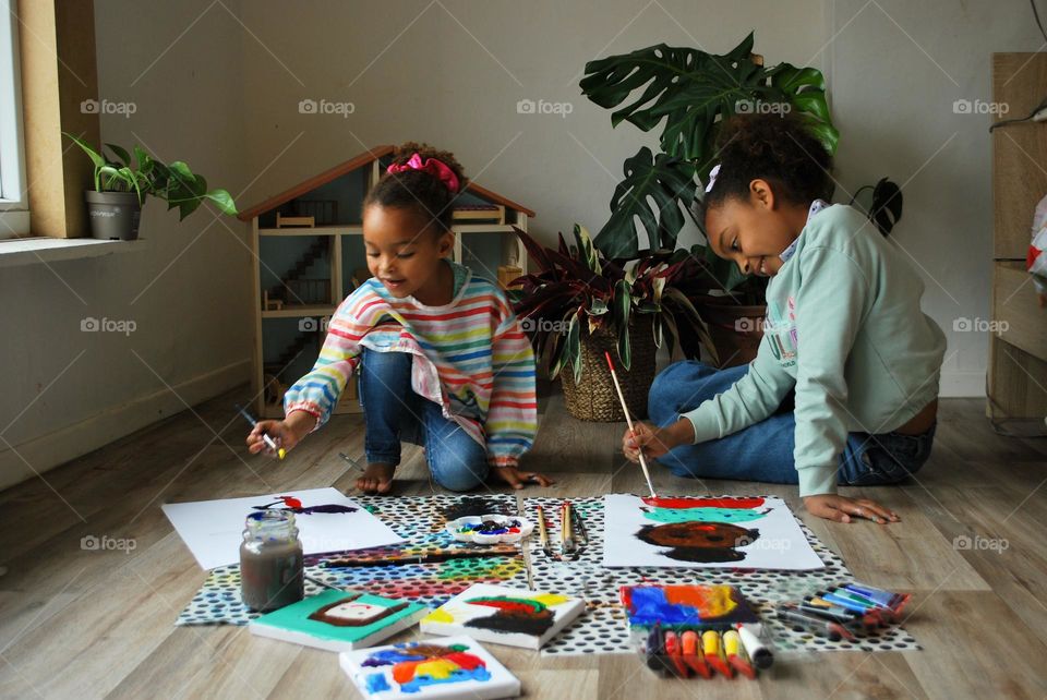 Little girl of mixed race painting