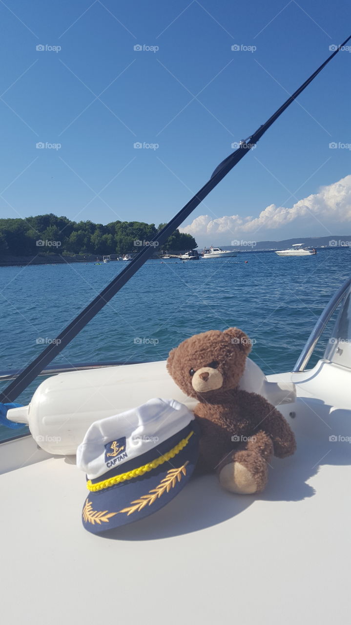 Teddy bear on his vacation on a yacht