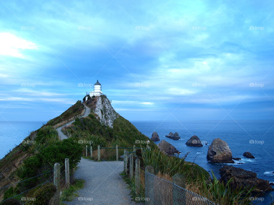 lighthouse at the sunset