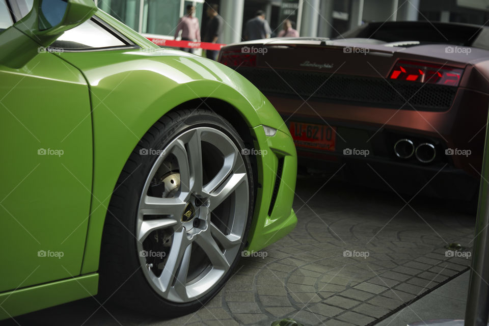 front wheel close up of green Lamborghini Gallardo squadra corse special edition coupe