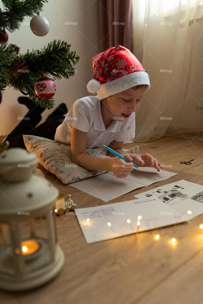 Baby boy writes a letter to Santa Claus, happy new year