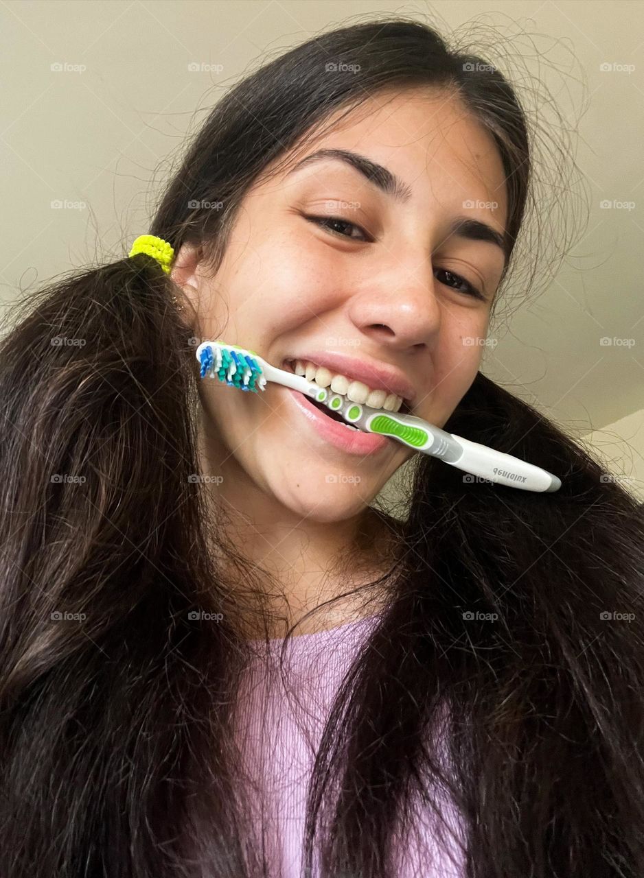 Energetic, Vibrant Portrait of Girl with Toothbrush