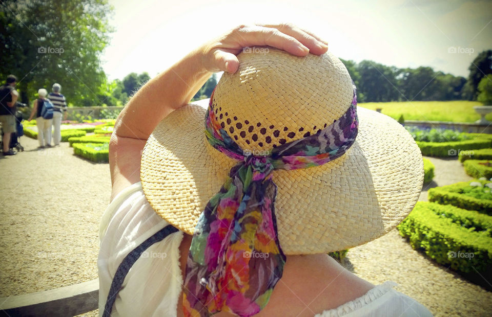 Rear view of woman wearing hat