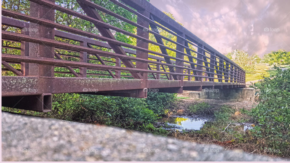 footbridge. Small footbridge crosses creek at local park