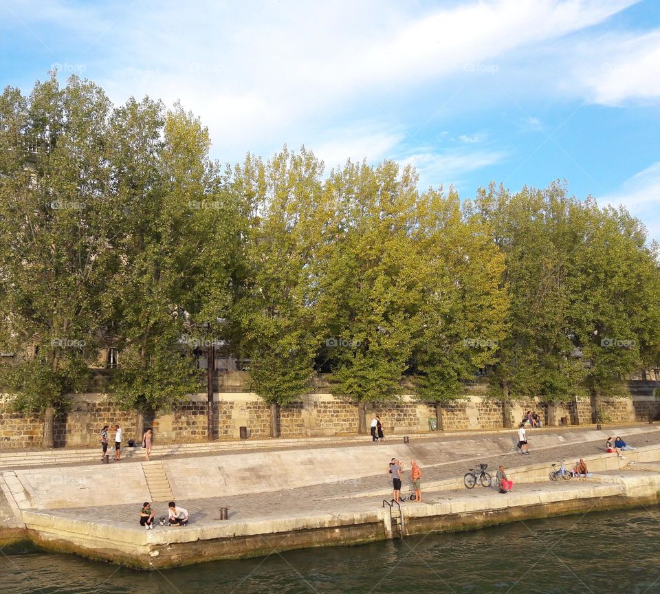 People relaxing on the banks of Seine