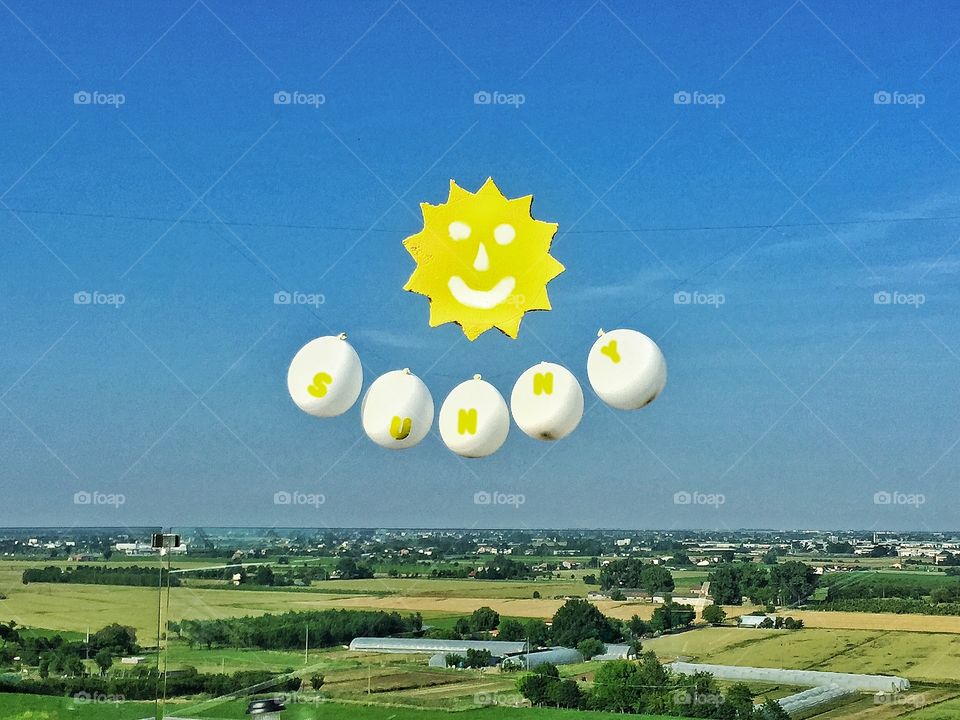 Ehit is the weather like today?. A happy sun on our