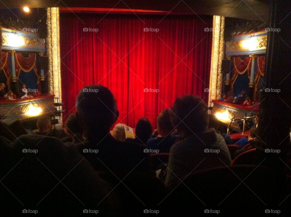 Theatre red curtain. Theatre audience