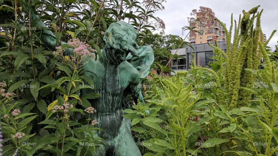 Statue among the Flora, Queens Botanical Garden