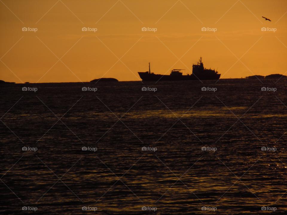 sunset water sea ship by MagnusPm