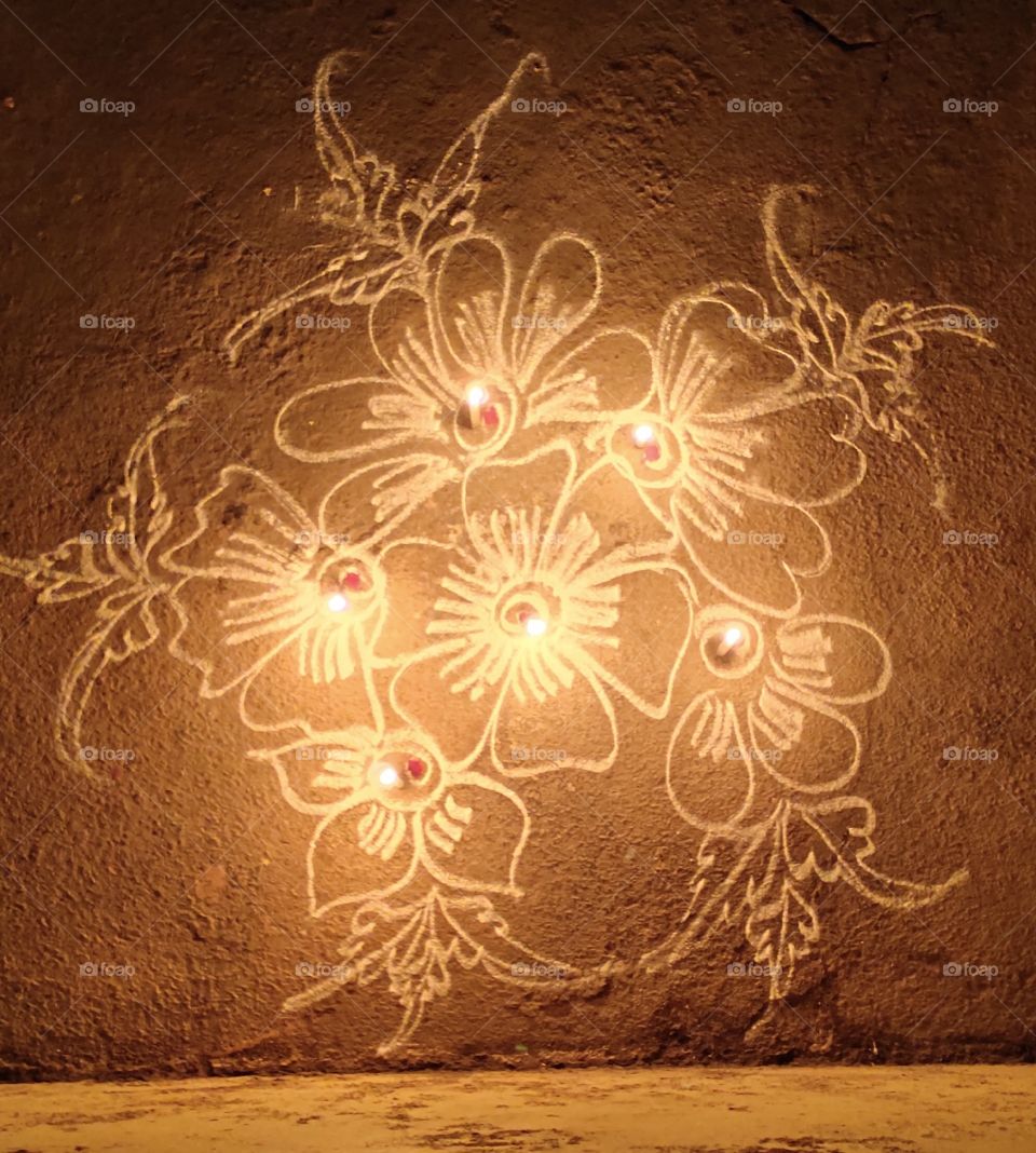 Inand guest. It gives lot of positive energydian traditional art called Rangoli, this art draws in front of everyone's home to welcome the God n.