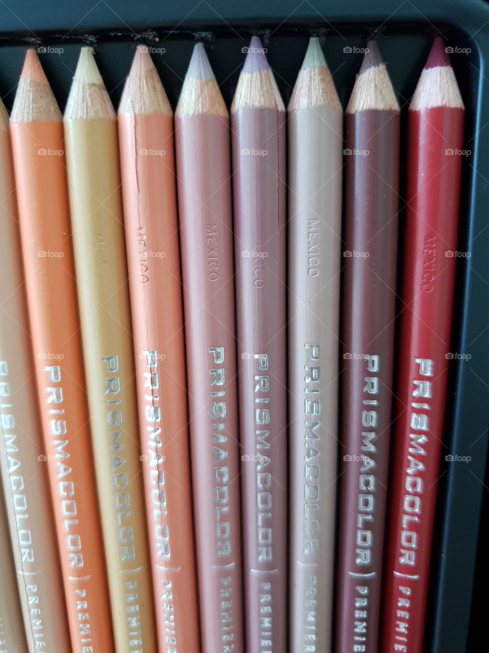 Prismacolor pencils in orange hues